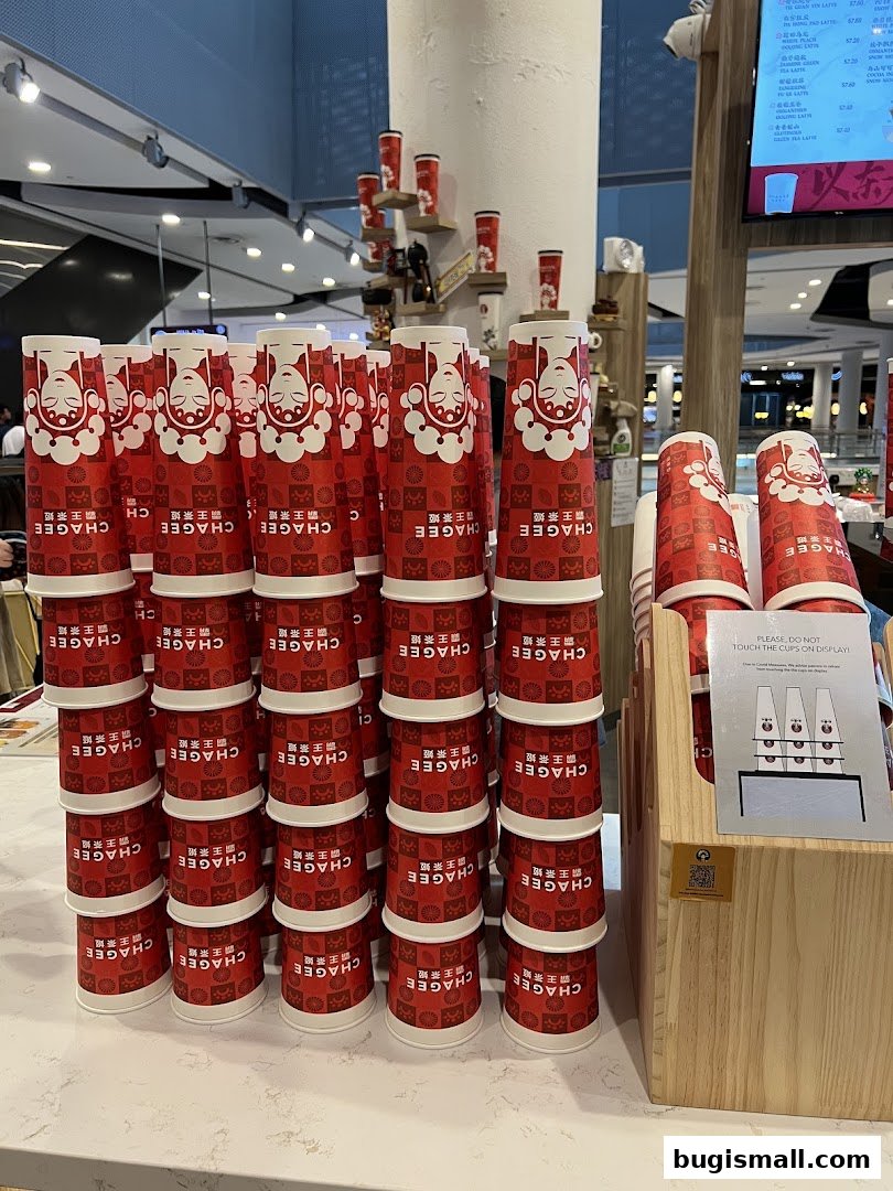 Stacks of red and white branded cups from CHAGEE are displayed prominently.