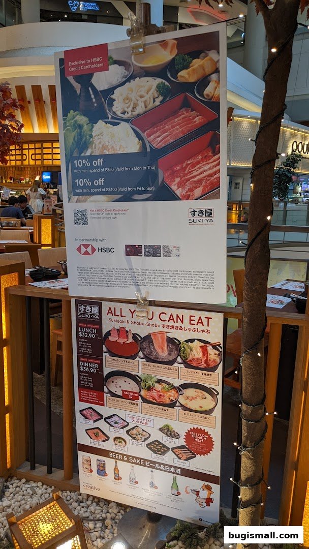 A promotional poster for Suki-Ya's all-you-can-eat shabu-shabu and sukiyaki with HSBC credit card offers.