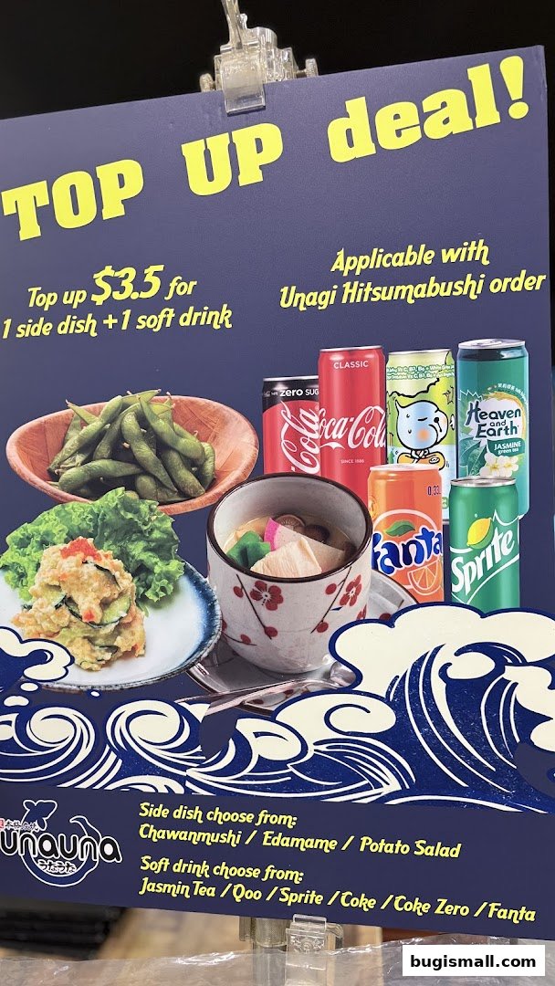 A promotional sign for a top-up deal offering a side dish and soft drink.