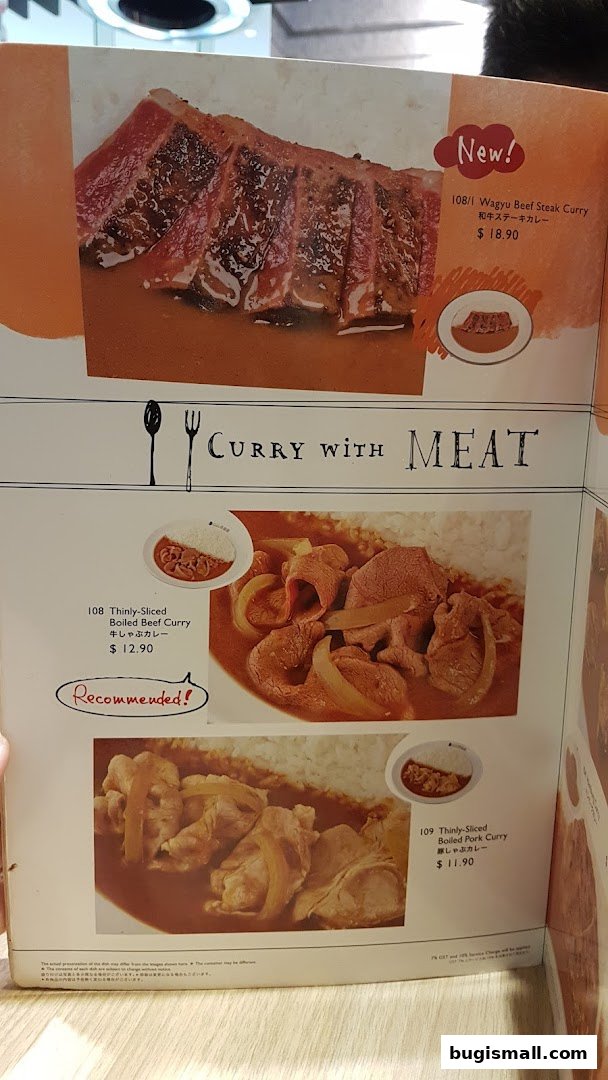 A menu from CoCo Ichibanya featuring various curry dishes with meat.