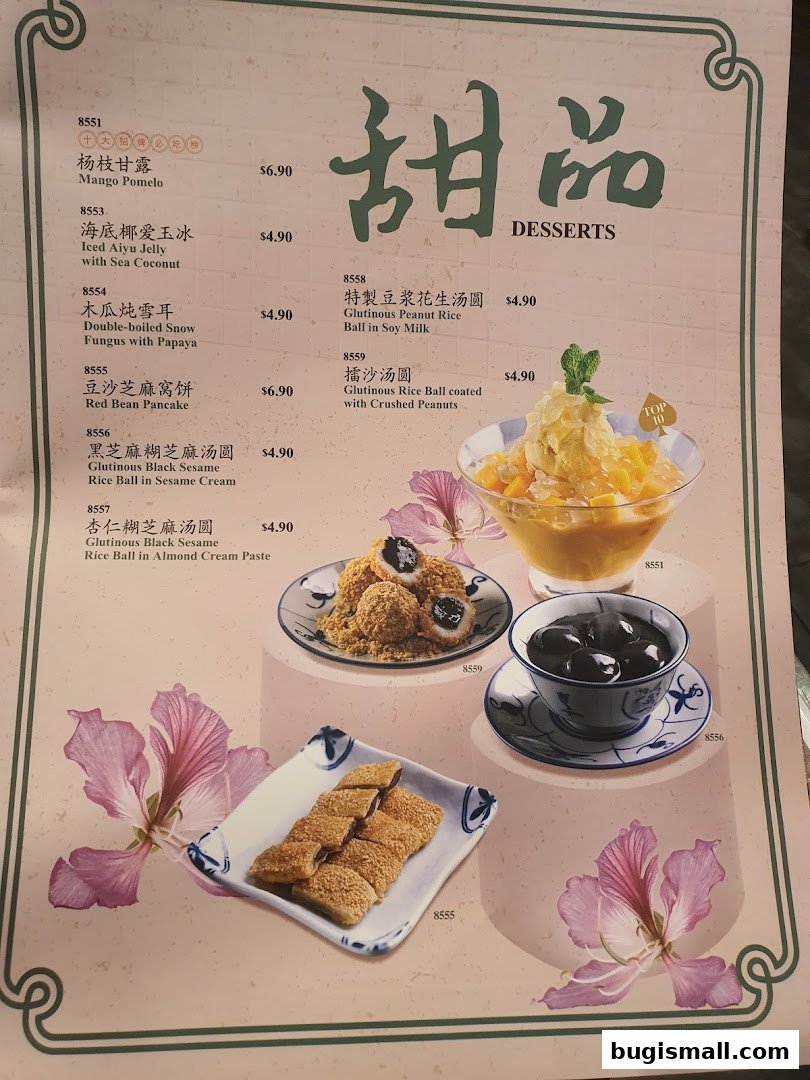 A menu from Xin Wang Hong Kong Café featuring various desserts with prices and descriptions.