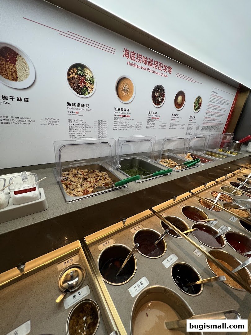 A display of various dipping sauces and ingredients for hot pot at Haidilao.