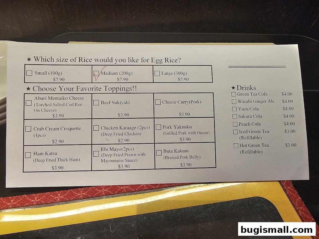 A menu from Scrambled Egg Rice Keisuke, showing rice sizes, toppings, and drinks.