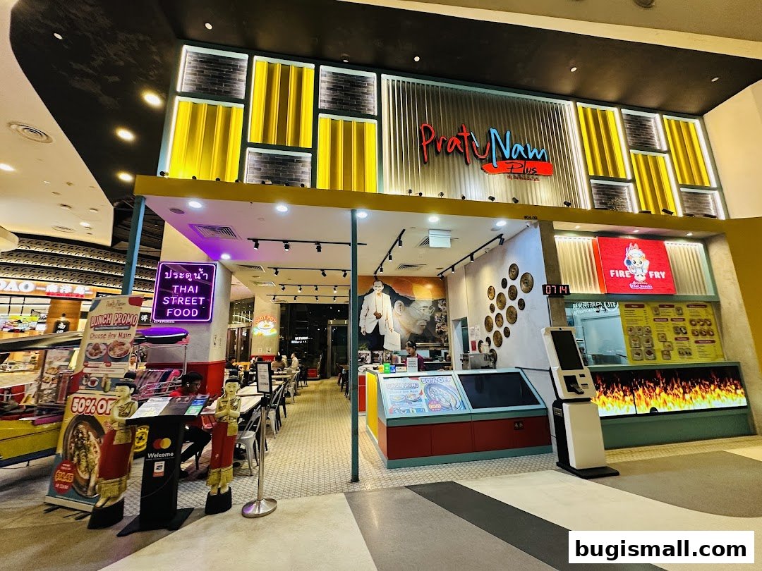 The exterior of Pratunam PLUS by Soi Thai Soi Nice, a Thai street food restaurant.