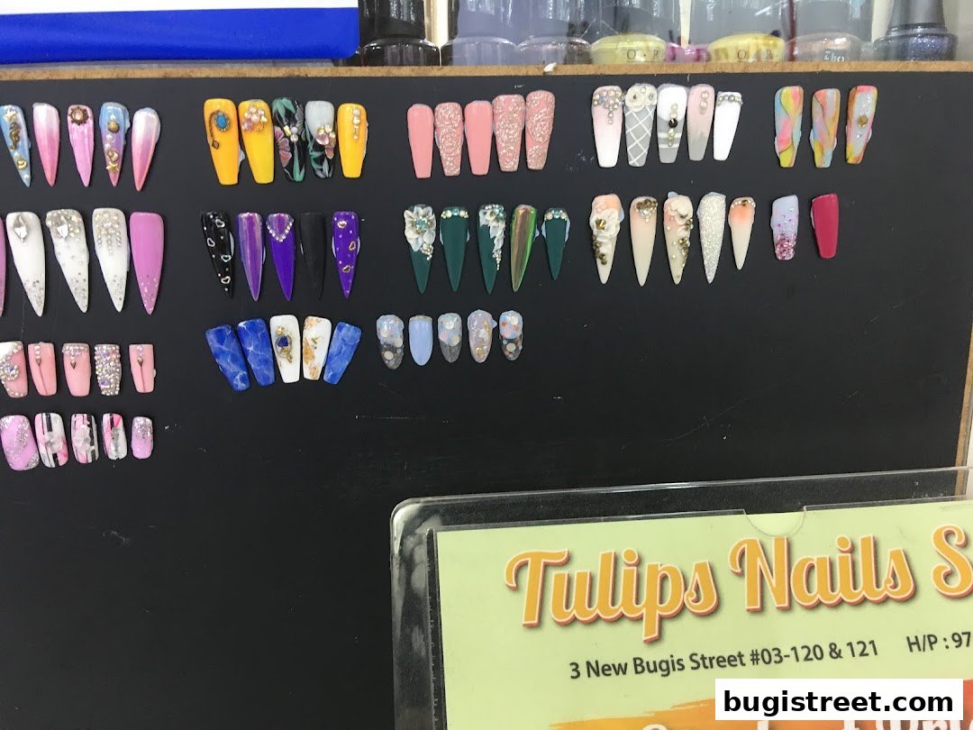 A display of various artificial nails with different designs and colors.