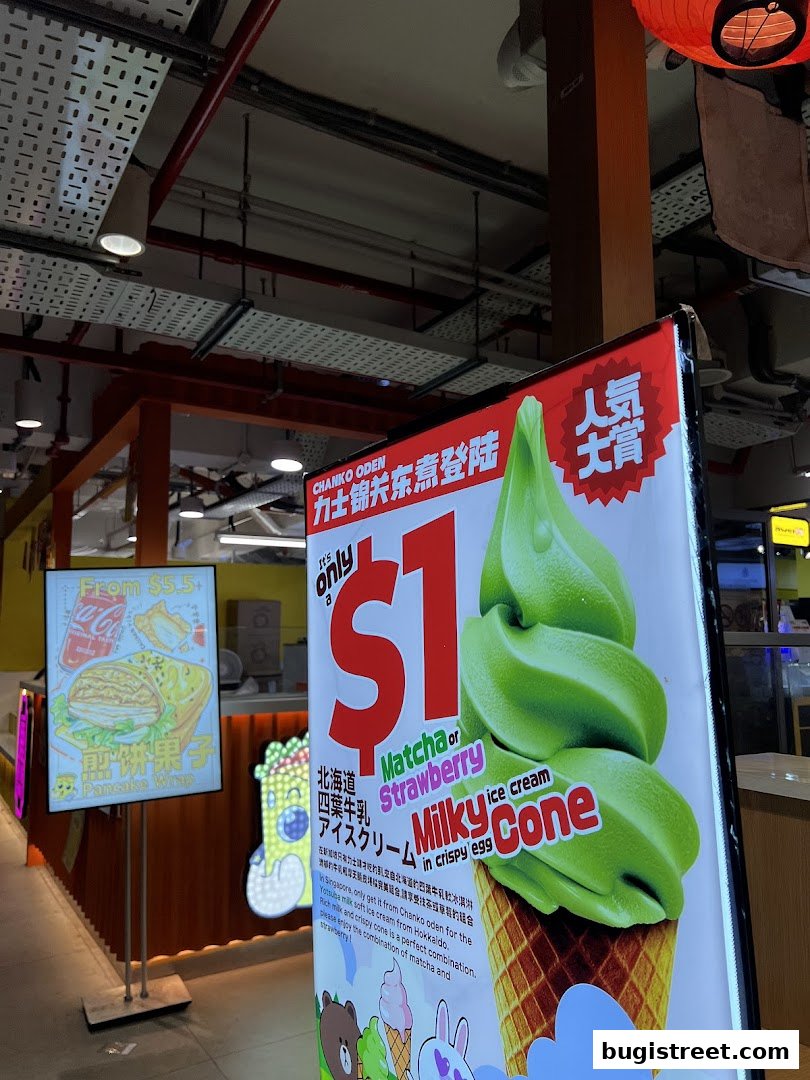 A sign advertising a $1 Matcha or Strawberry Milky Cone ice cream from Chanko Oden.