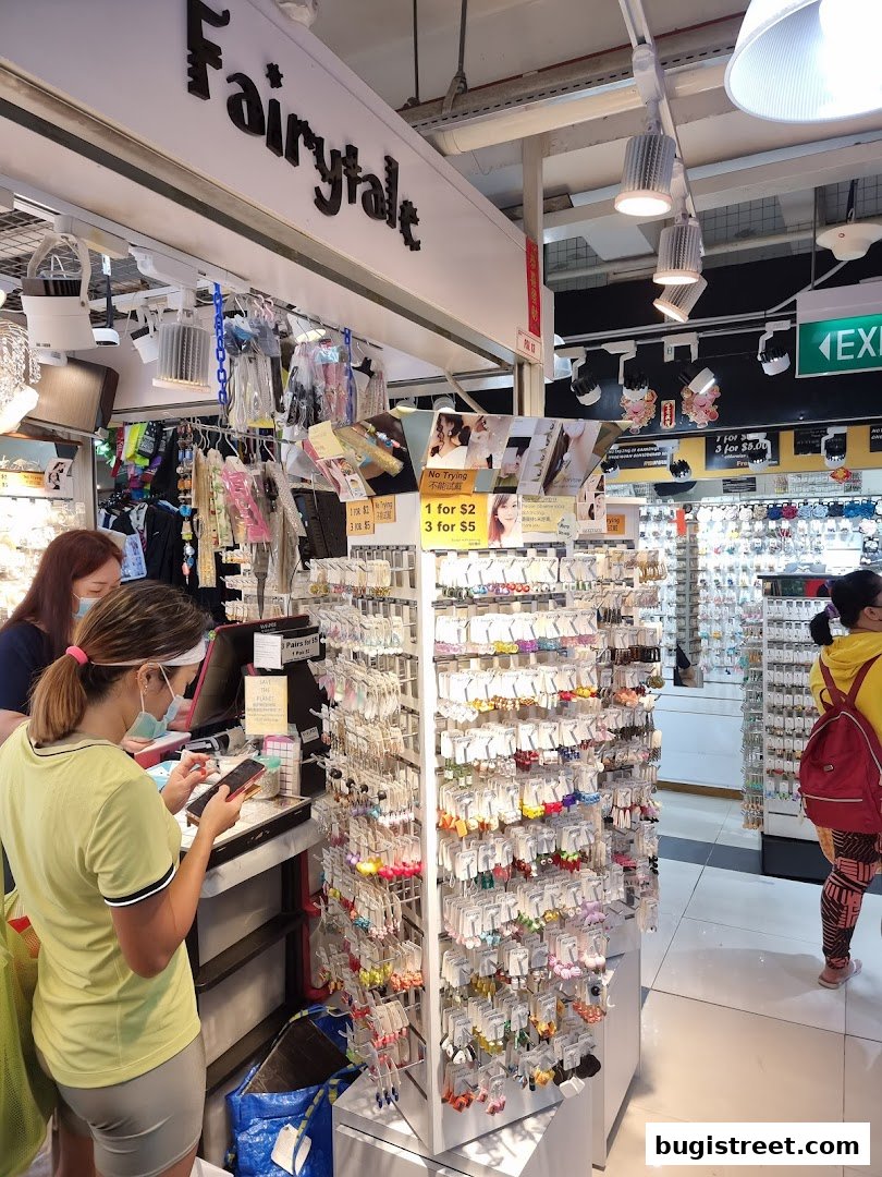 A shop interior displaying a wide variety of colorful earrings and accessories.