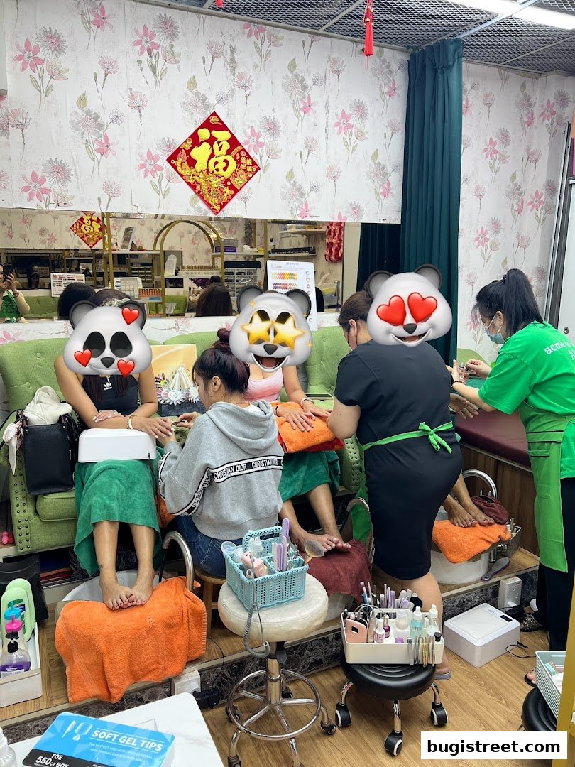 Nail technicians pampering clients with manicures and pedicures in a well-equipped salon.