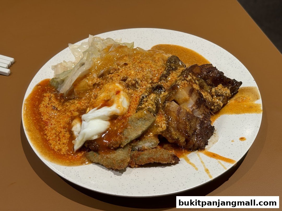 A plate of delicious food with meat, vegetables, and sauce, served at Hawkers Street BPP.