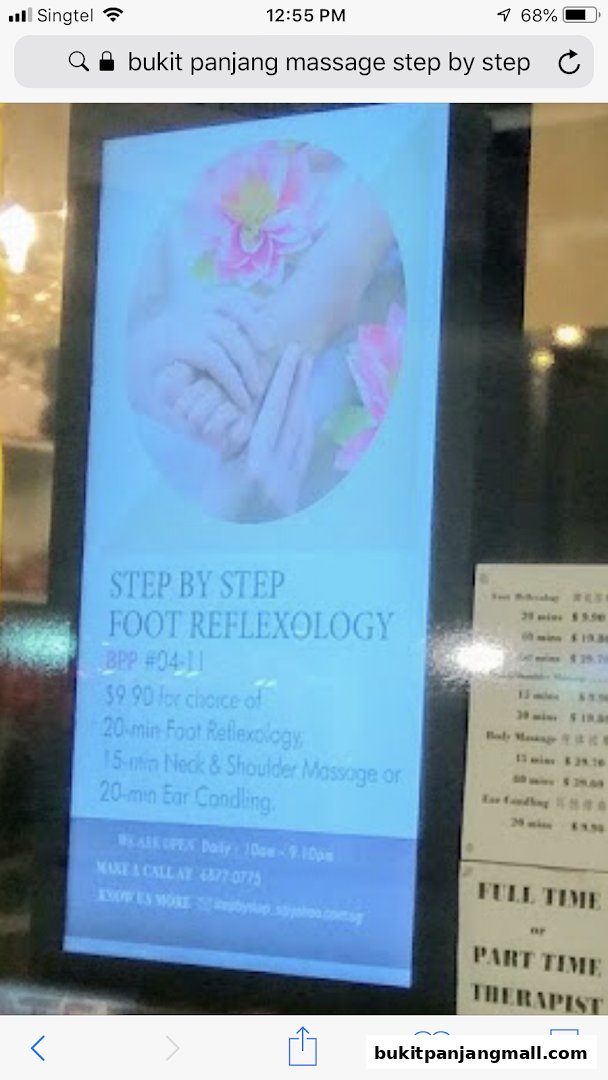 A digital advertisement for Step by Step Foot Reflexology offering various massage and ear candling services.