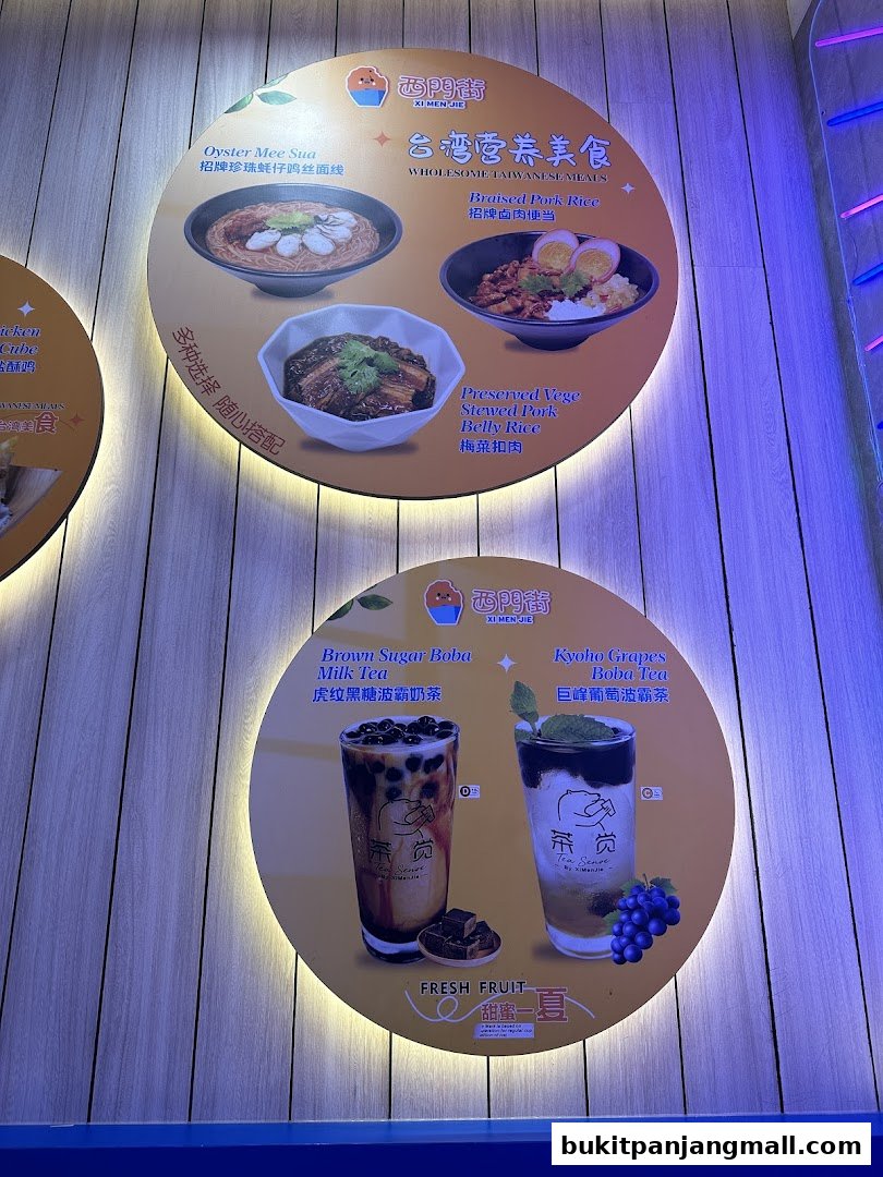 A display board showcasing Taiwanese meals and bubble tea drinks from Xi Men Jie.