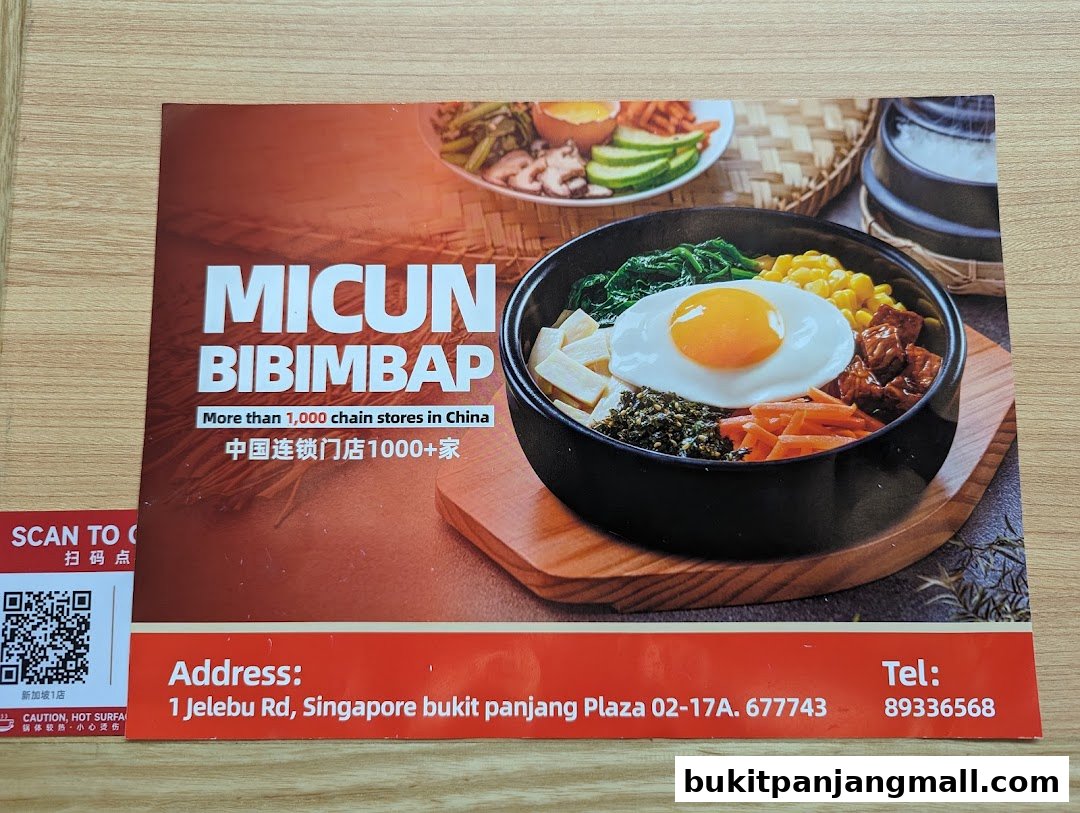 A flyer for Micun Bibimbap featuring a delicious-looking bibimbap dish and contact information.
