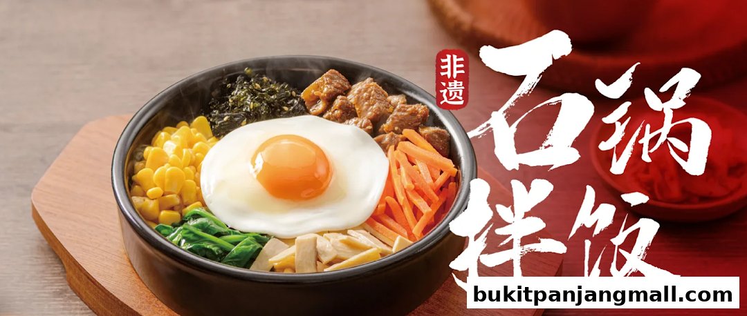 A steaming bowl of bibimbap with beef, egg, corn, spinach, and carrots.