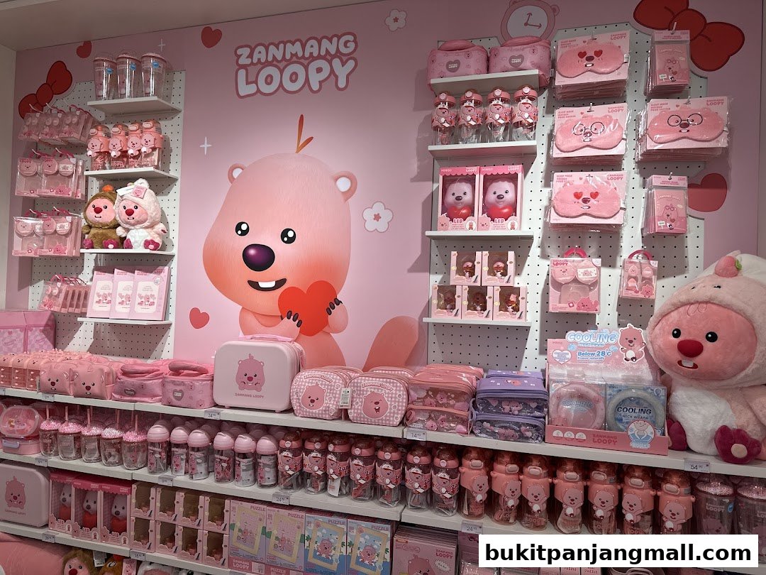 A vibrant display of pink merchandise featuring the character Loopy from Zanmang Loopy.