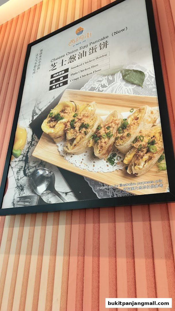 A menu board featuring a new cheese onion egg pancake with various filling options.