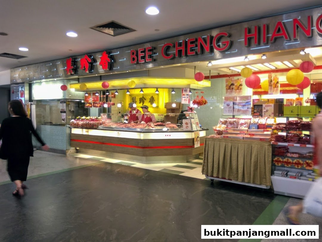 A Bee Cheng Hiang shop with a display of meat products and packaged goods.