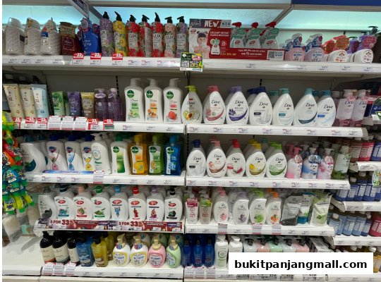 Shelves stocked with a wide variety of body wash and personal care products.