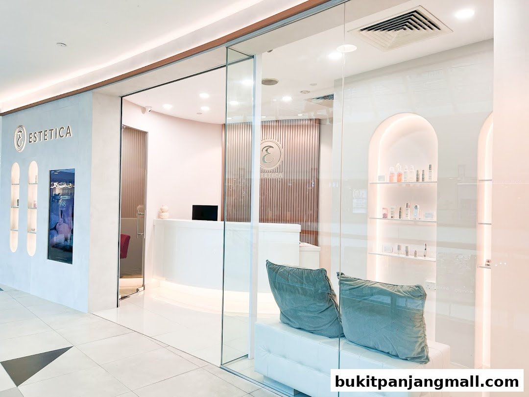 The modern entrance of Estetica Beauty, featuring a clean reception area and display shelves.