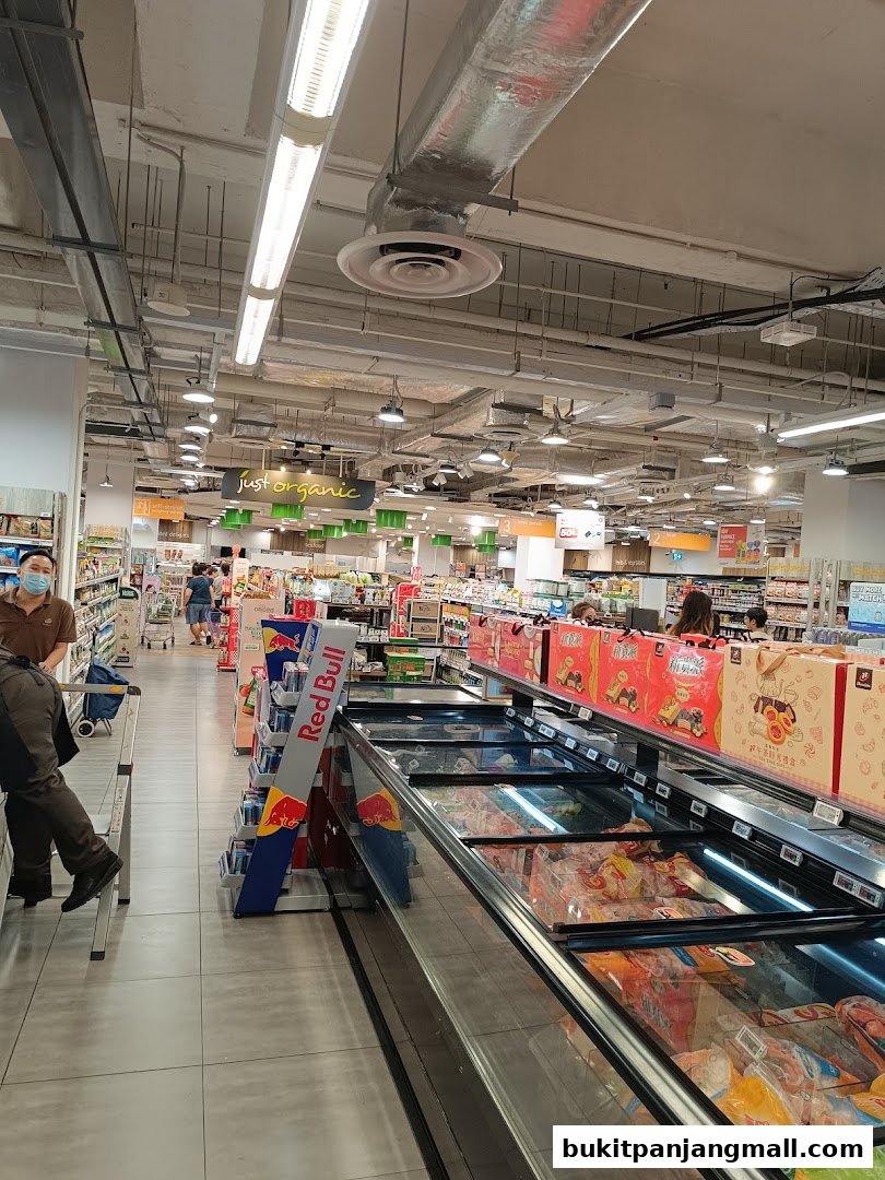 Interior view of a FairPrice Finest supermarket with aisles of products and shoppers.