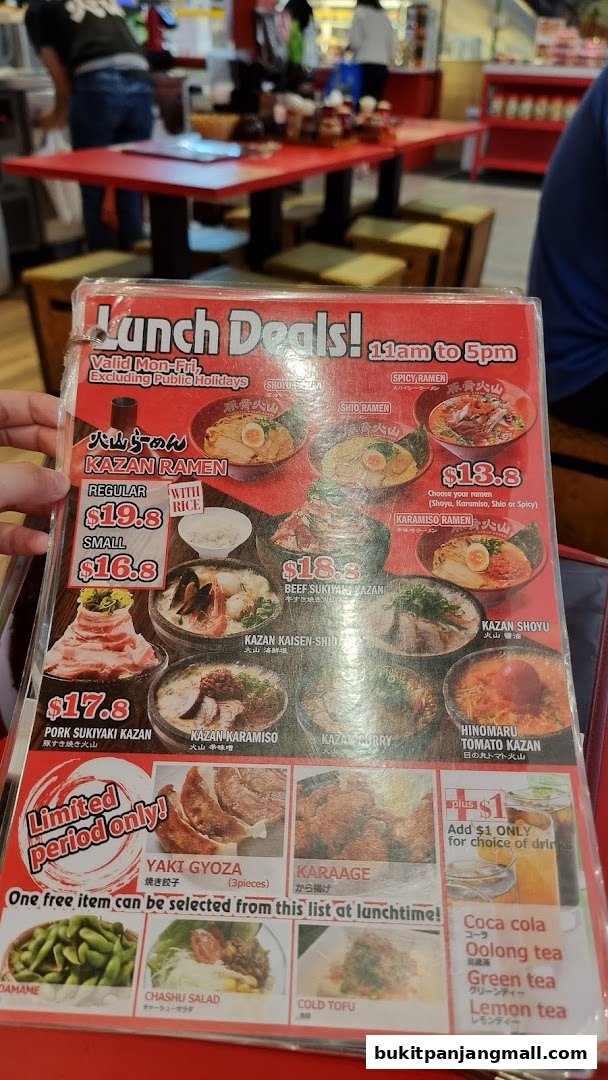 A menu for Tonkotsu Kazan featuring lunch deals on various ramen dishes and sides.