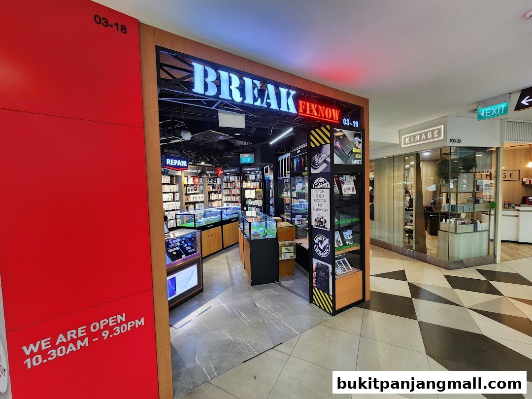 The storefront of a phone repair shop called Break Fix Now, with operating hours displayed.