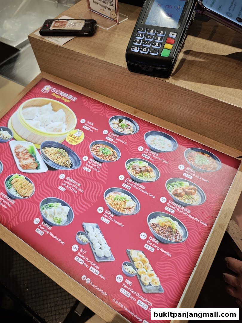 A menu display for Flourful Delight featuring various noodle soups, dumplings, and pan-fried dumplings.