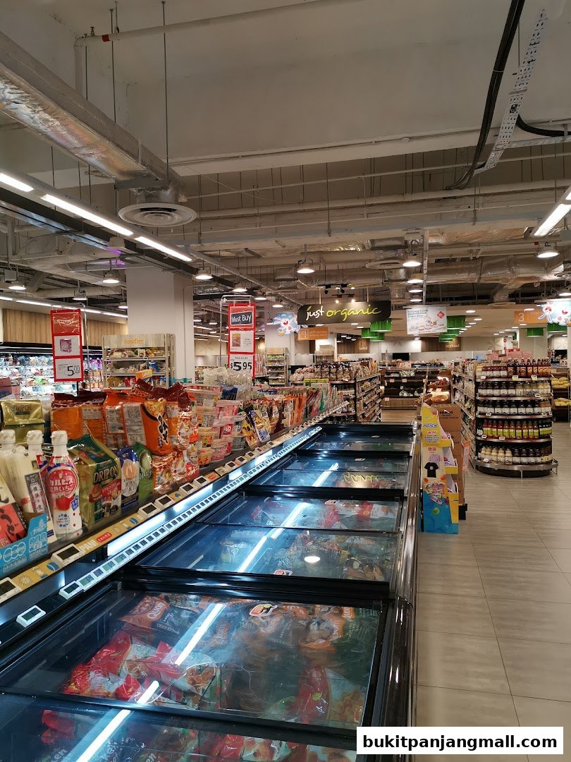 Interior view of a FairPrice Finest supermarket with frozen food aisles and product displays.