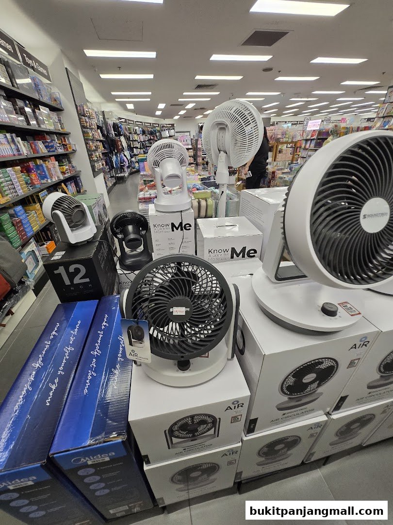 A display of various fans and air circulators inside a store.