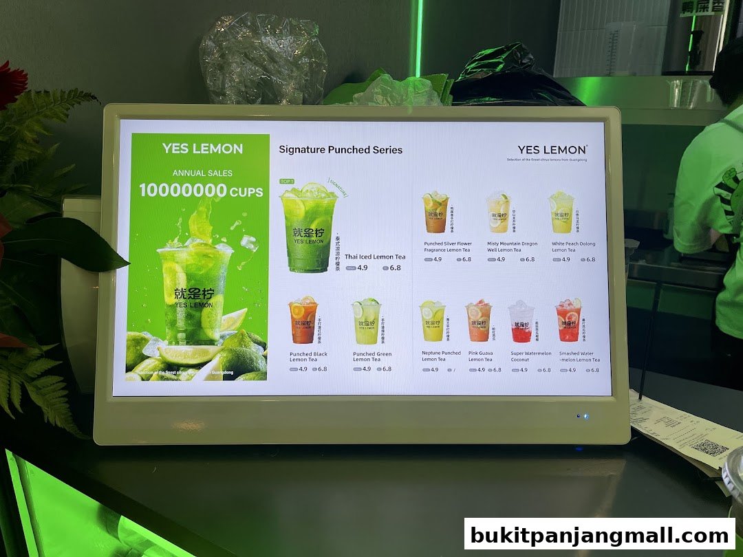 A digital menu displays various lemon tea drinks with images and prices.