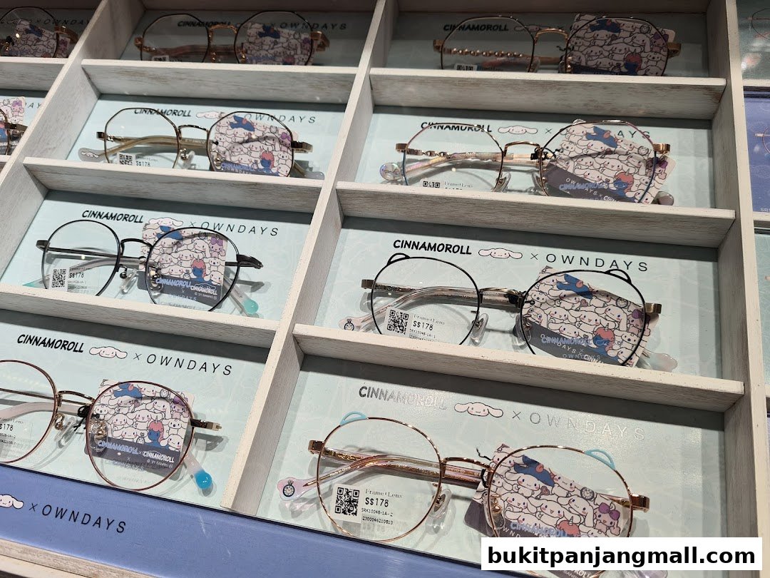 A display of eyeglasses featuring Cinnamoroll designs in a retail store.