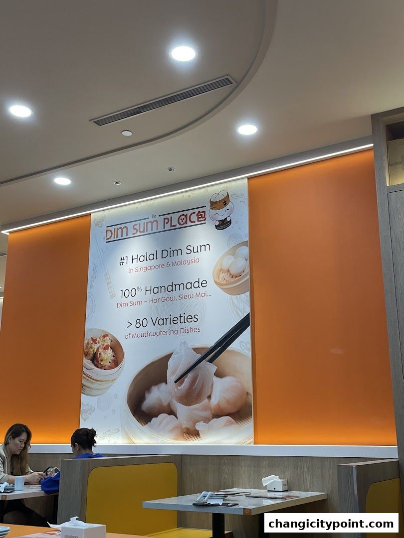 A wall display at The Dim Sum Place promoting their #1 Halal Dim Sum.