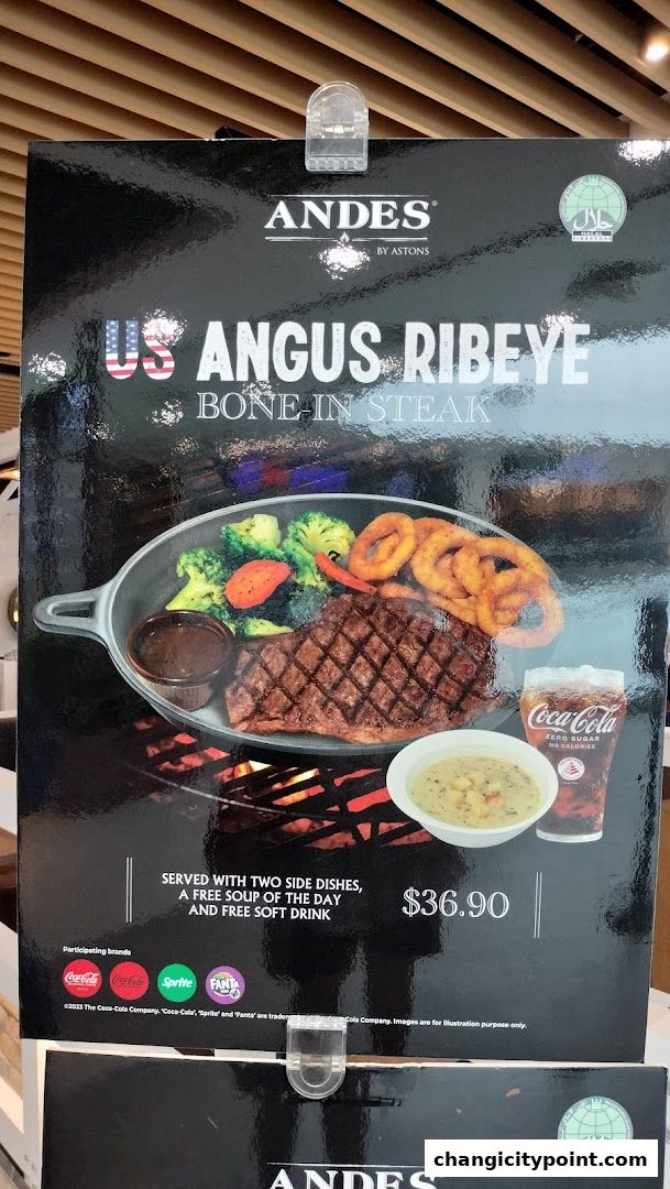 A menu board advertising a US Angus Ribeye Bone-In Steak meal.