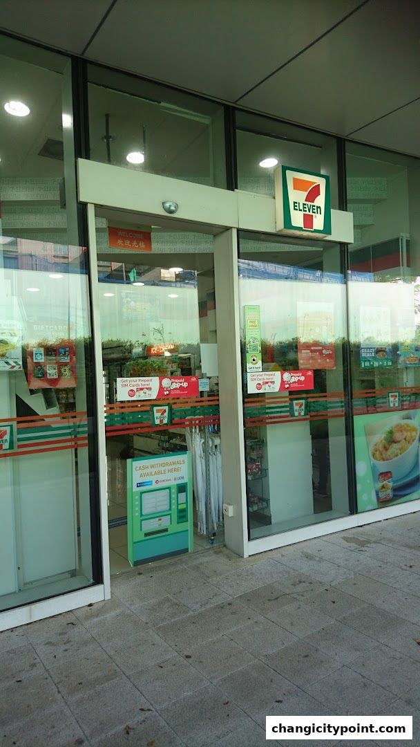 The exterior of a 7-Eleven convenience store with its logo and entrance visible.
