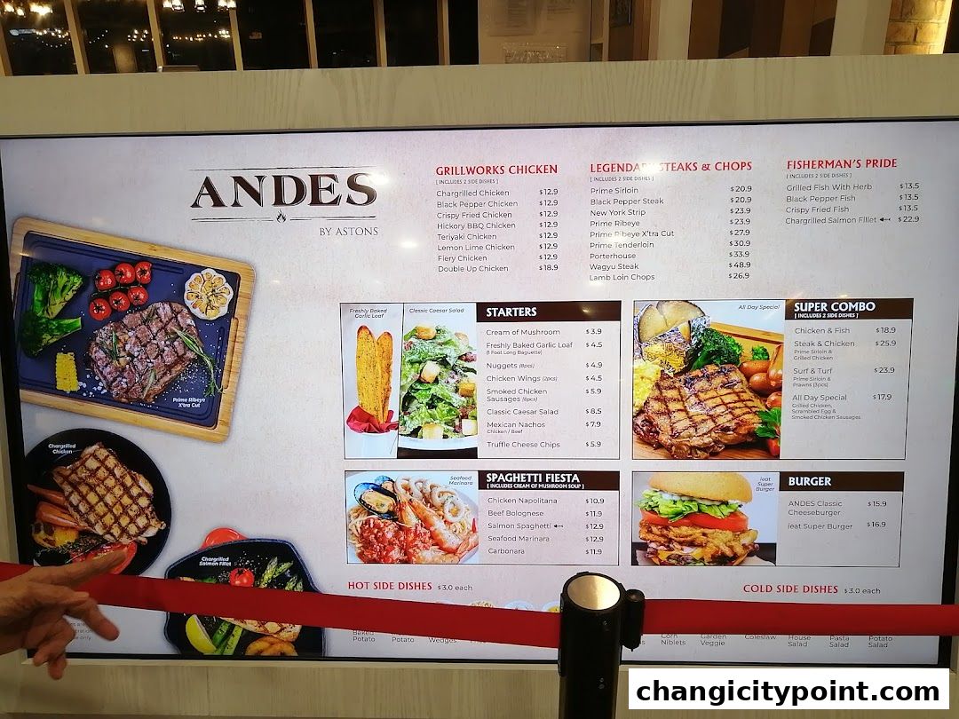 A digital menu board displaying various food items and their prices from ANDES by ASTONS.