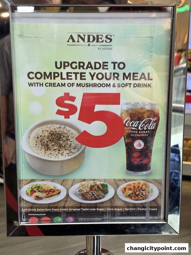 A promotional sign for Andes by Astons offering a meal upgrade with soup and drink for $5.