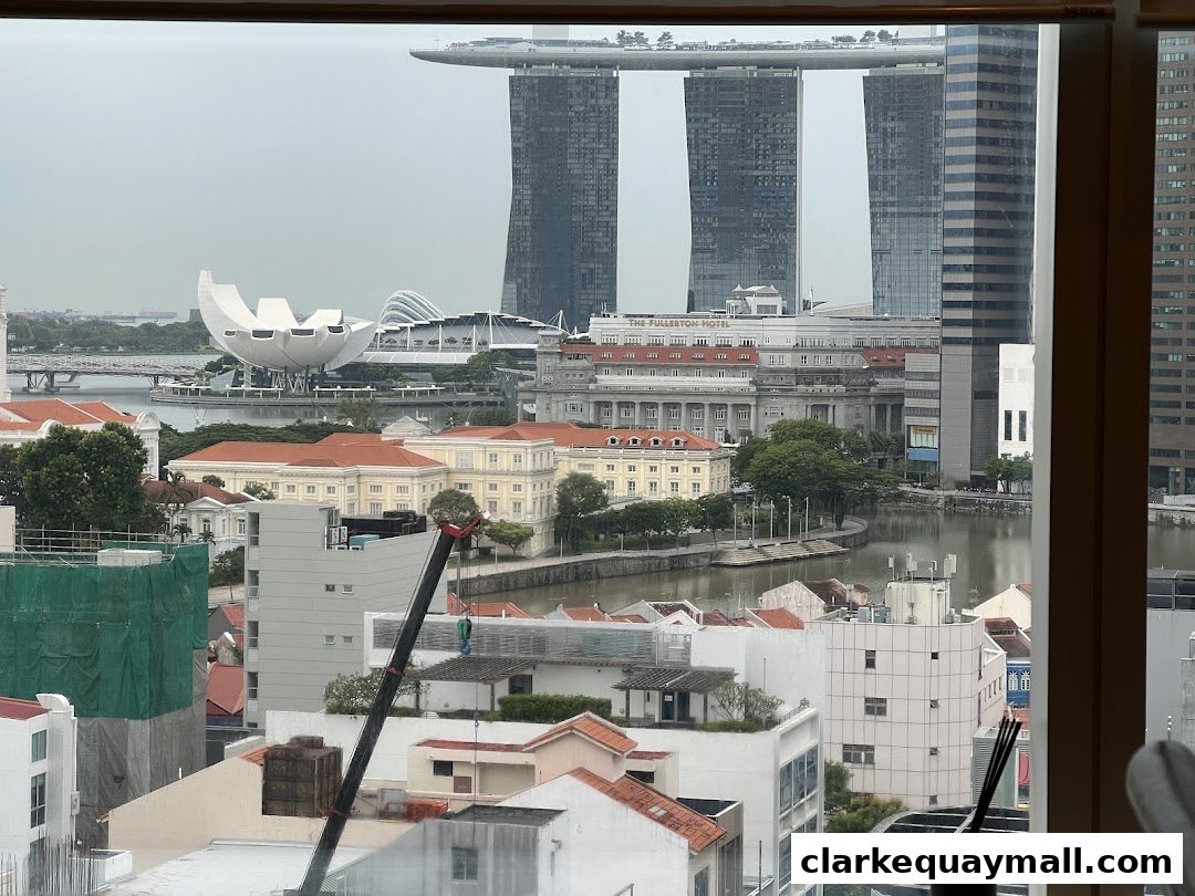 A panoramic view of Singapore's skyline featuring iconic landmarks and city architecture.