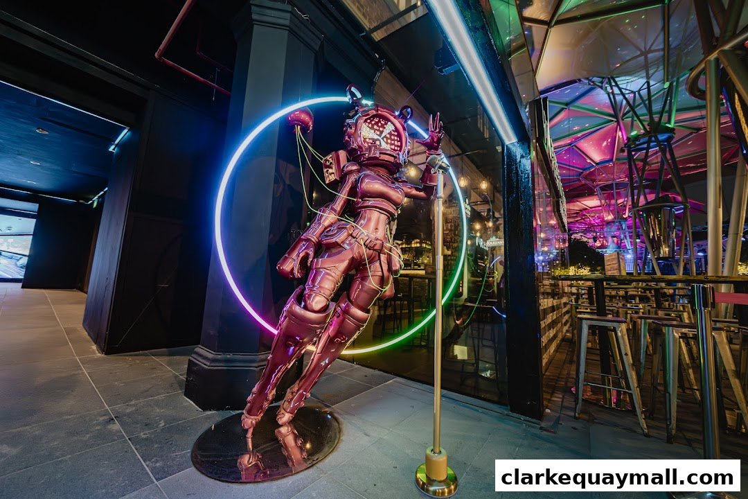A futuristic robot statue with neon lights in front of a bar with colorful lighting.