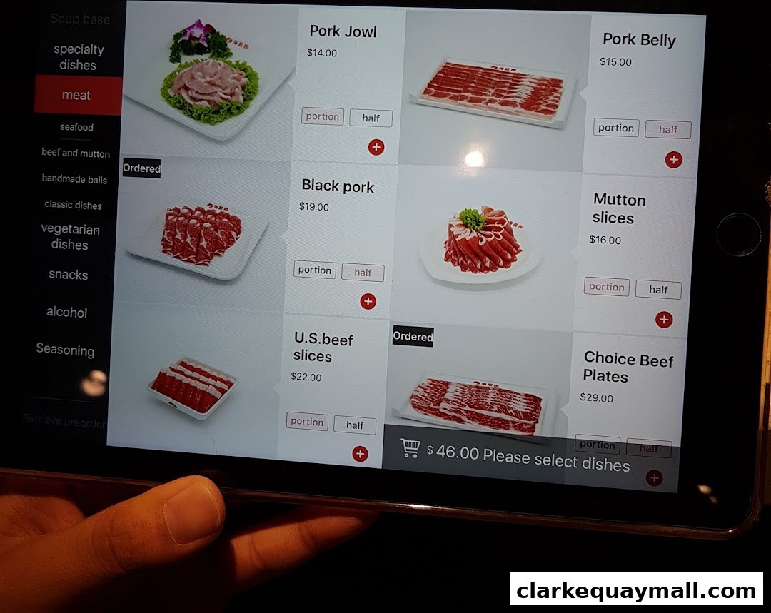 A tablet screen displaying a menu of meat options for hot pot.