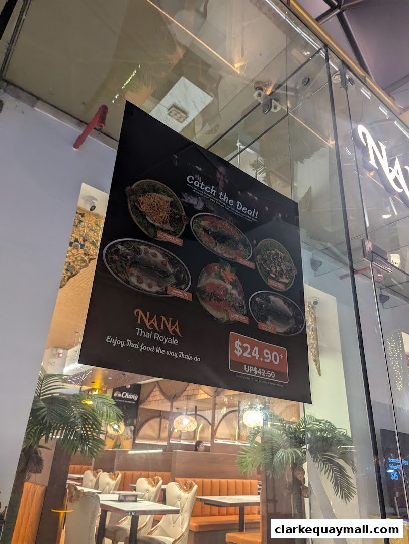A poster advertising a Thai food deal is displayed in front of a restaurant interior.