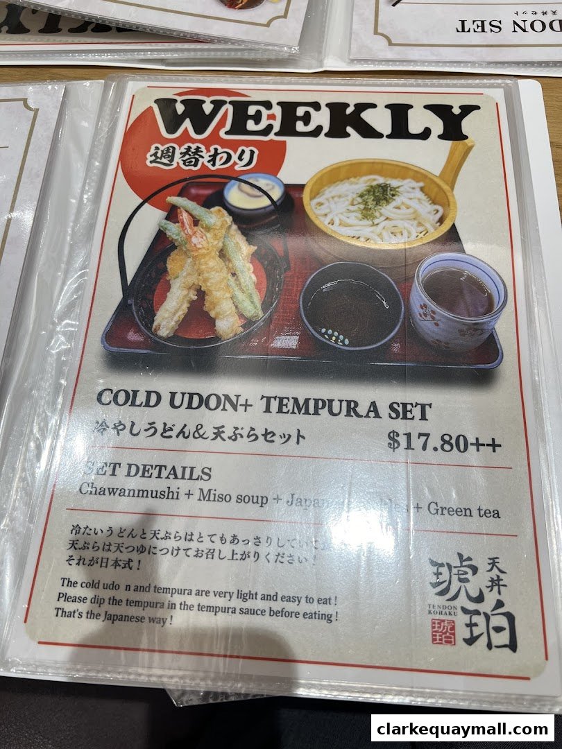 A menu featuring a Cold Udon and Tempura Set with accompanying dishes.