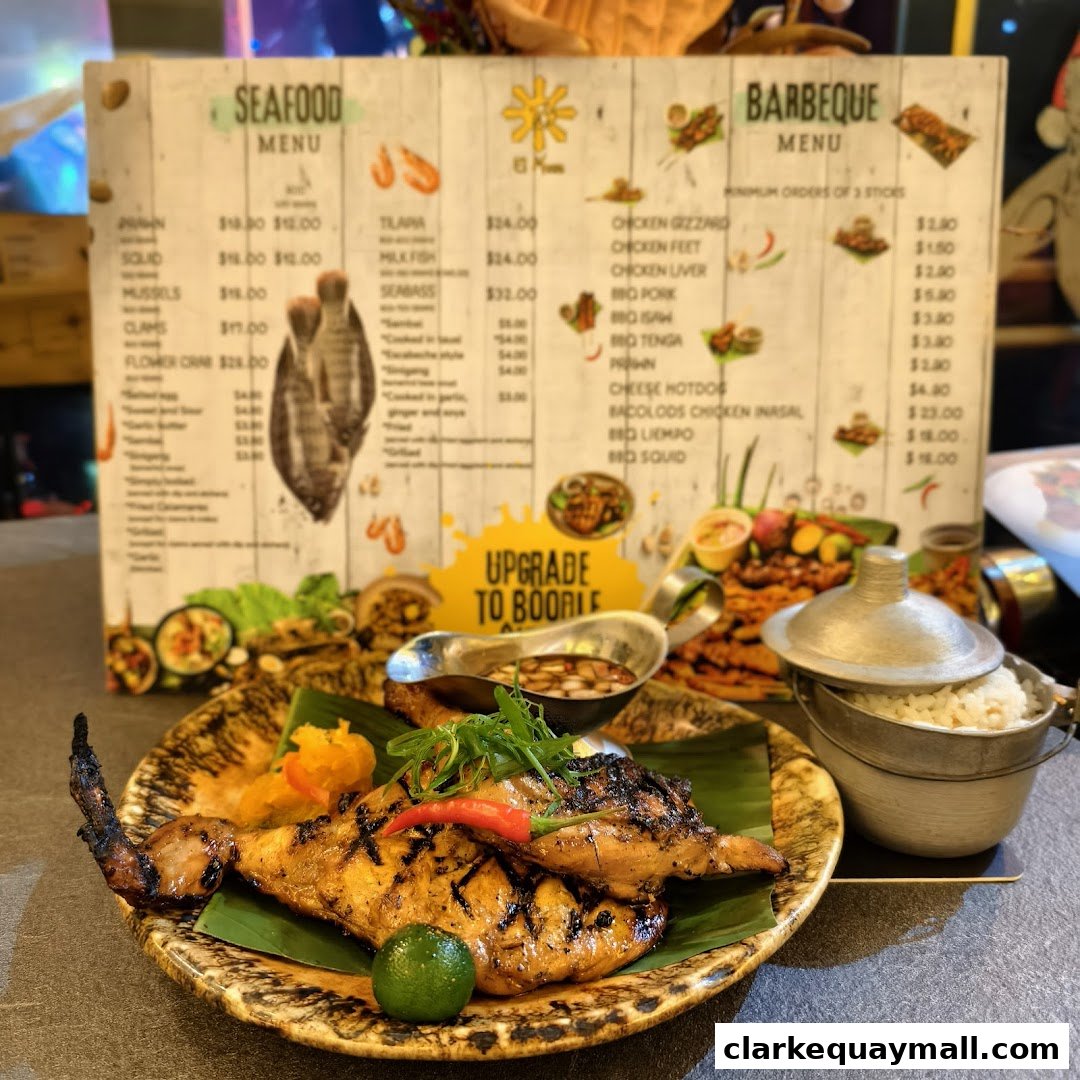 A plate of grilled chicken with rice and a menu in the background.