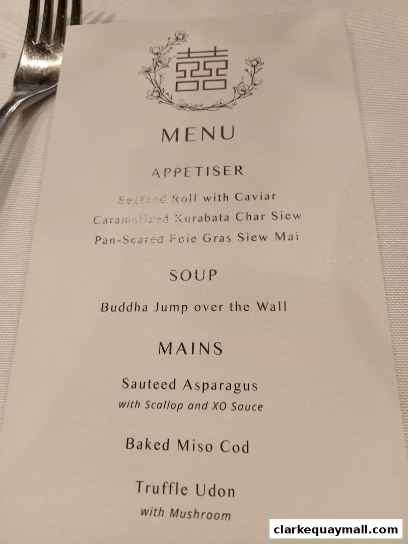 A menu from Yin Bar Singapore featuring appetizers, soup, and main courses.