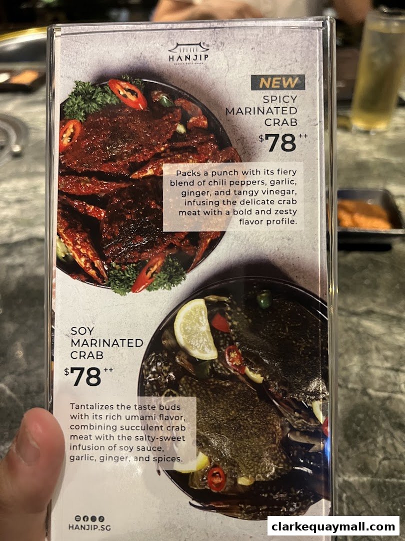 A menu featuring two types of marinated crab: spicy and soy.