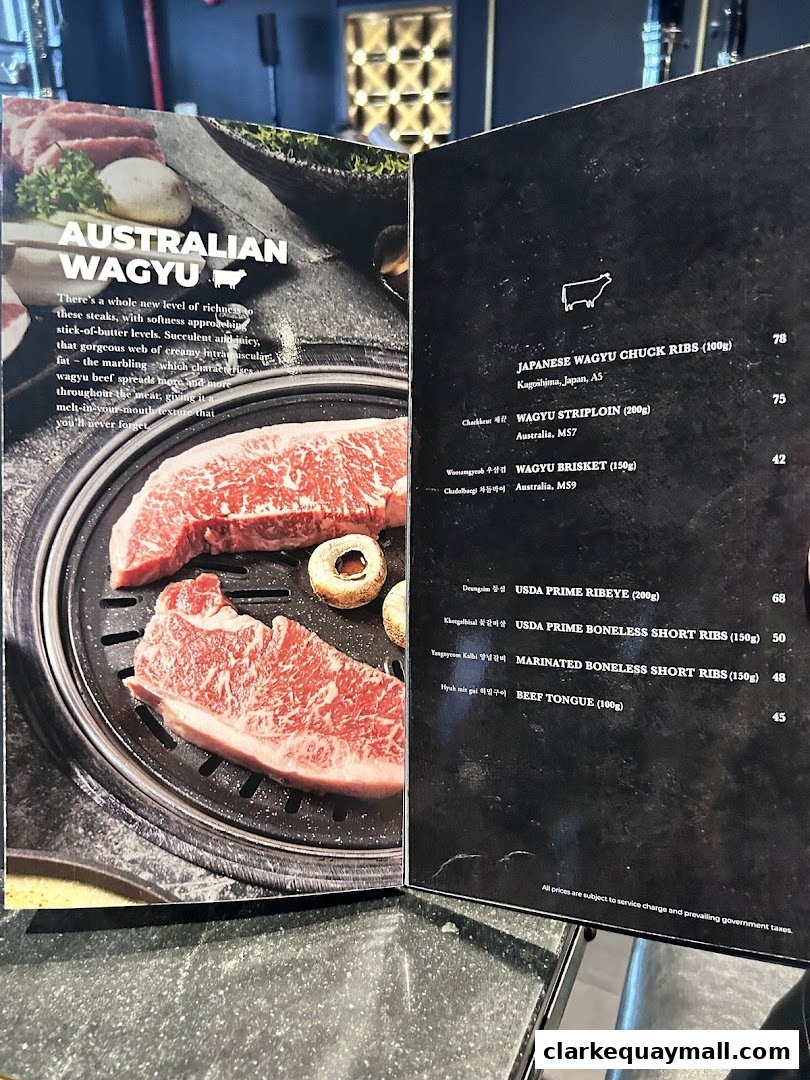 A menu featuring Australian and Japanese Wagyu beef cuts with descriptions and prices.
