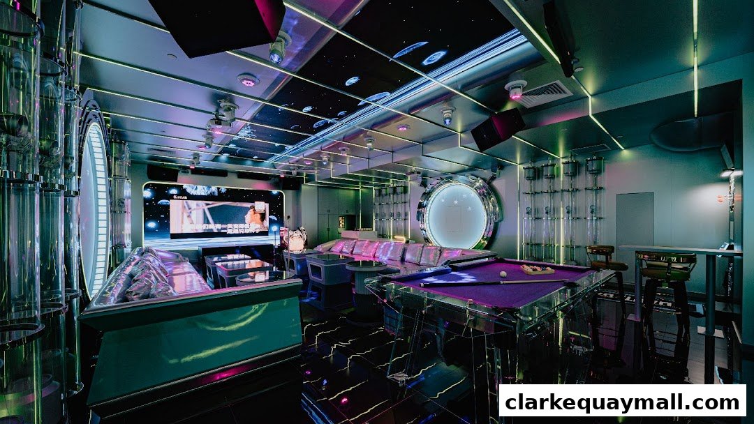 A futuristic lounge with a pool table, plush seating, and neon lighting.