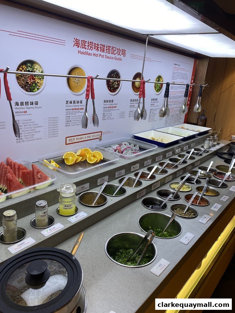 A wide selection of sauces, condiments, and fruits for hot pot at Haidilao.