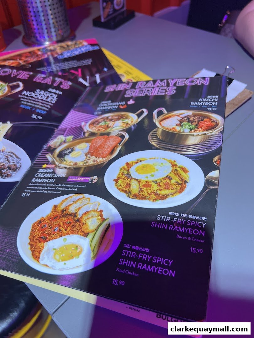 A menu featuring various Shin Ramyon dishes with appetizing images and descriptions.