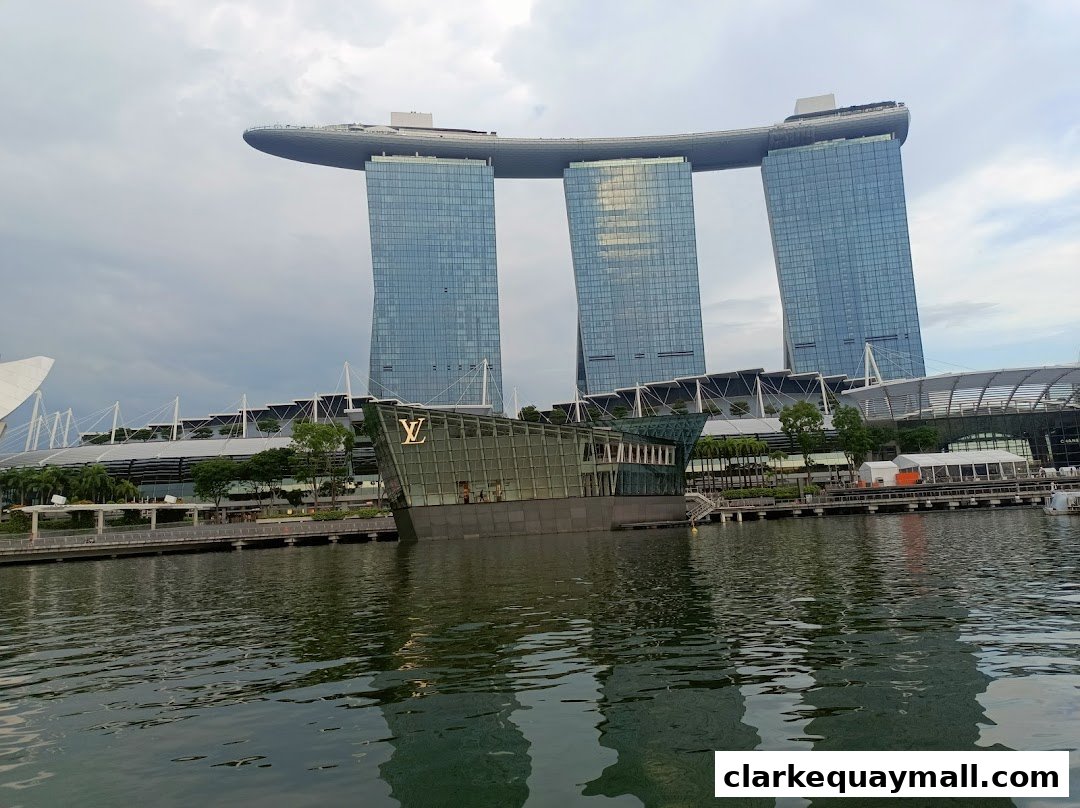 A view of the Louis Vuitton store at Marina Bay Sands, Singapore, with the iconic hotel in the background.