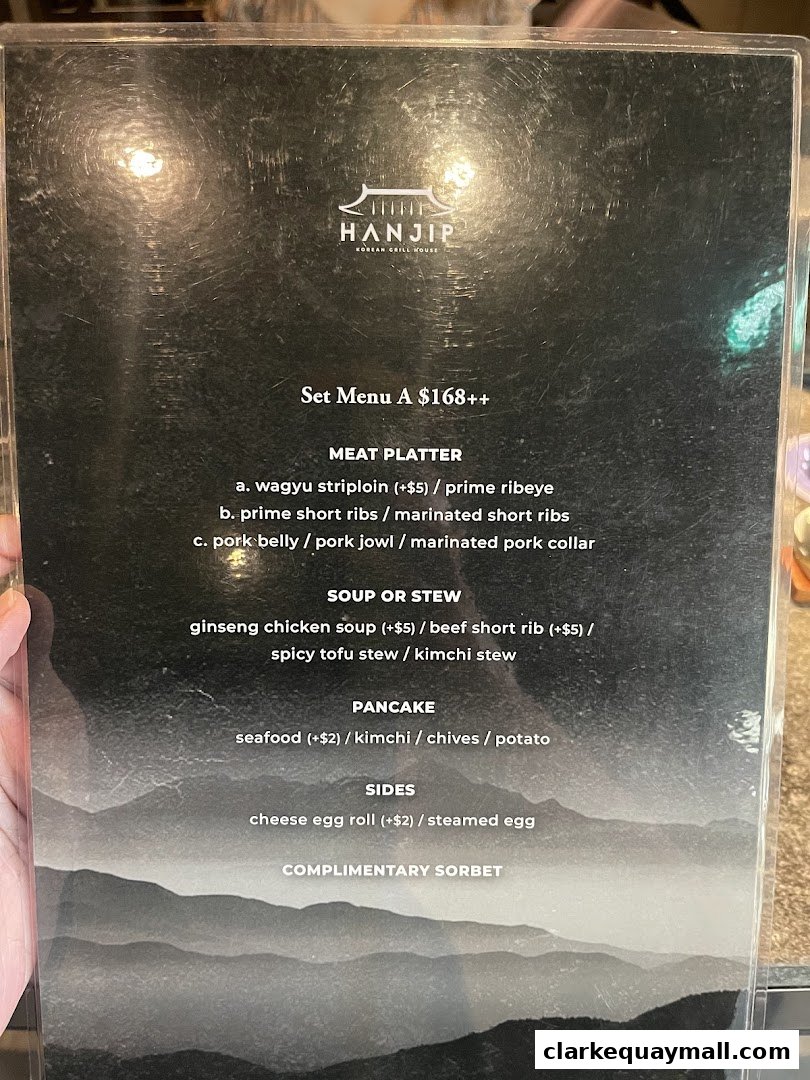 A menu for Hanjip Korean Grill House featuring Set Menu A with meat platters, soups, sides, and dessert.