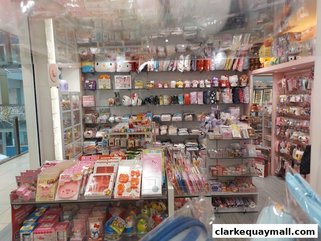 A brightly lit gift shop interior filled with shelves of merchandise, including Hello Kitty items.